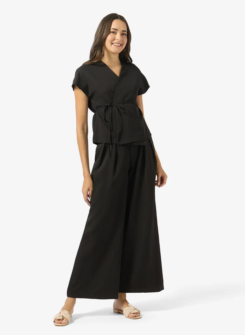 جينجر طقم بلوزة برباط وبنطلون واسع الساق