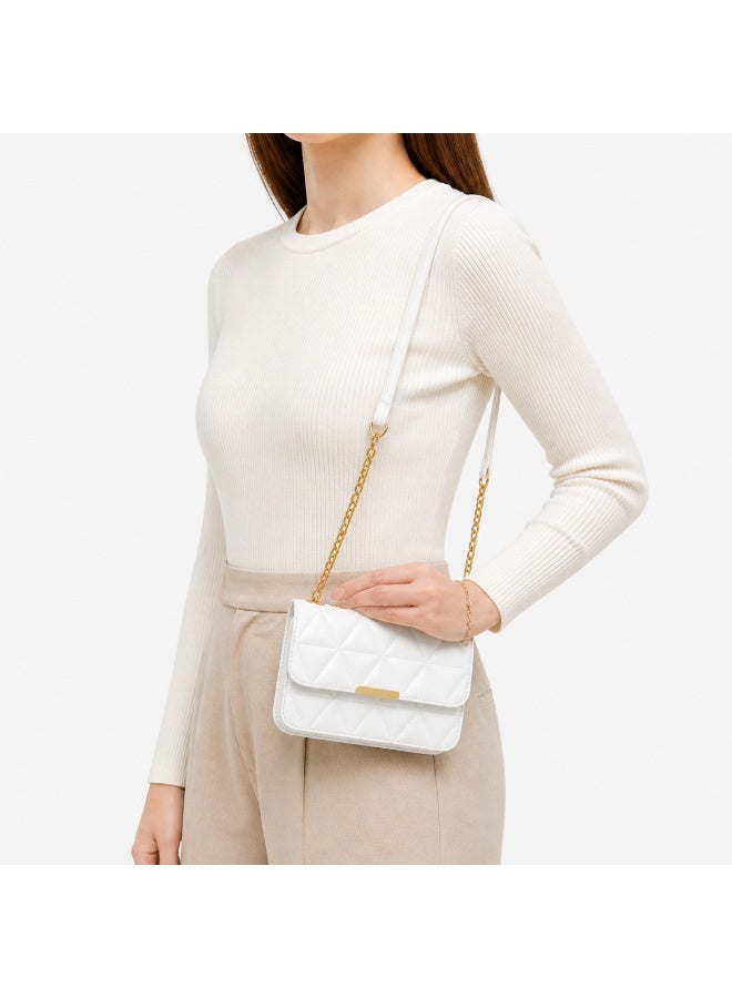 Women's padded shoulder bag with a stylish crossbody design – luxurious leather with a gold chain and metal clasp - Image 1