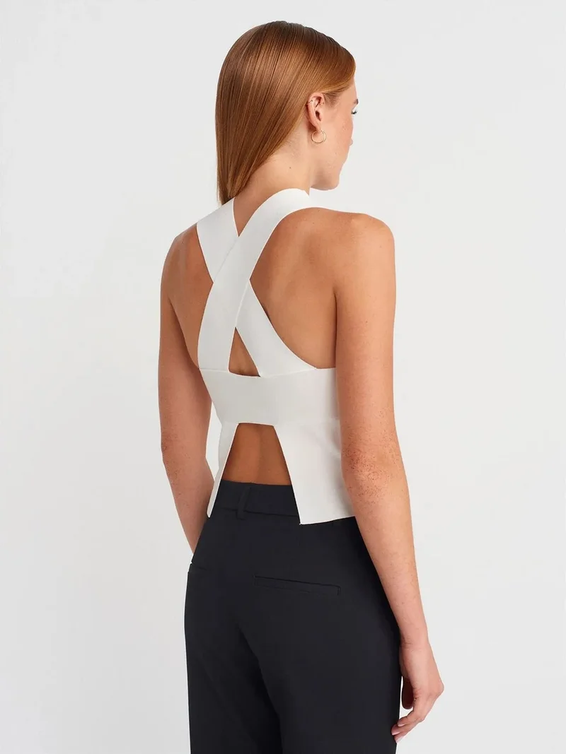 ديلفين DILVIN Sleeveless Cut-Out Knit Blouse