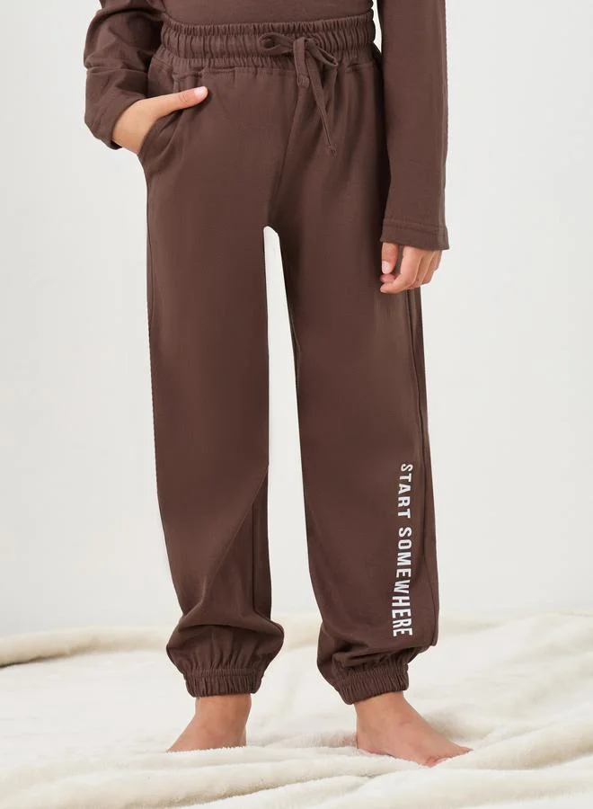 Styli Brown Styli Boys Slogan Print Long Sleeve T-Shirt and Pyjama Set for Men | Best Price UAE