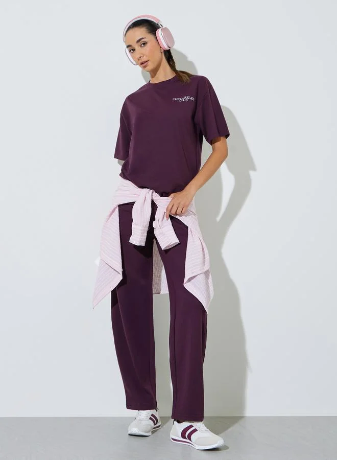 Styli Purple Oversized Slogan Print Cotton Blend T-Shirt