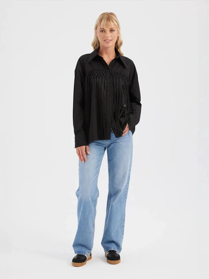 زوبعة قميص فضفاض بشرّابات