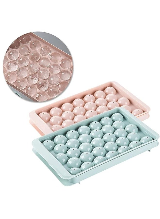 Clazkit قالب مكعبات ثلج بلاستيكية صغيرة مستديرة من Clazkit مع غطاء لصنع كرات الثلج للعصائر الطازجة، والموكتيلات، والويسكي، والكوكتيلات، والشاي، والقهوة. يحتوي على 33 تجويفًا، سهل الفتح، قابل للتكديس في المجمد. عبوة من قطعتين، أزرق، وردي. - Image 2