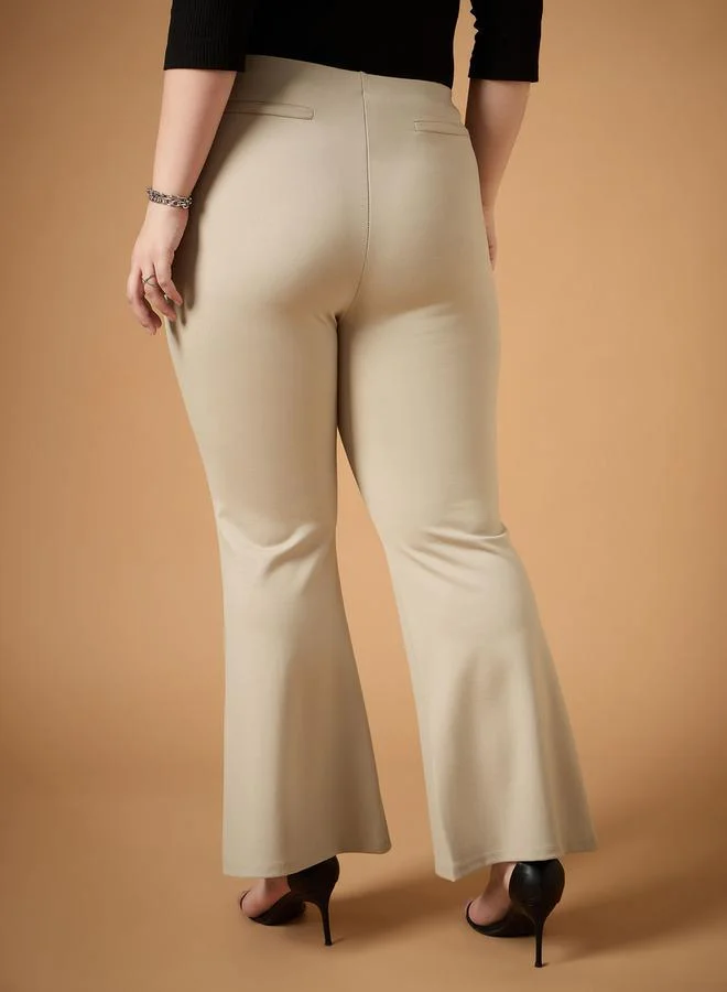 SASSAFRAS Plus Size Solid Flared Pants by Styli
