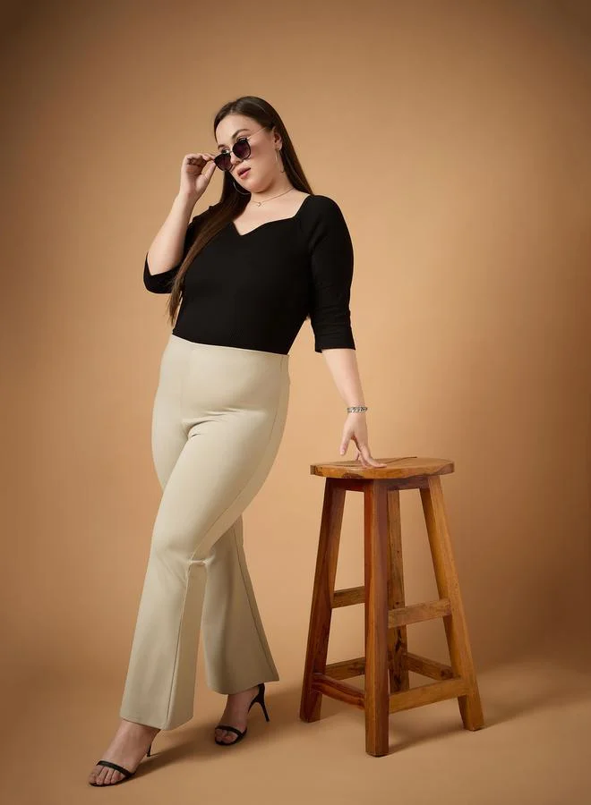 SASSAFRAS Plus Size Solid Flared Pants by Styli