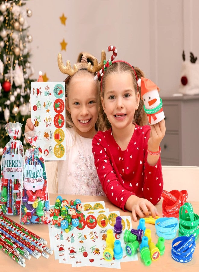 Kesote Christmas Stocking Stuffers Party Favors Stationery for Kids, 144pcs 24 Pack Christmas Goodie Bag Fillers Including Pencils, Wristbands, Stickers, Stamps and Erasers in Treat Bags - Image 3
