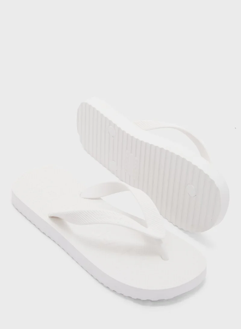 TOMMY JEANS Logo Flip Flops