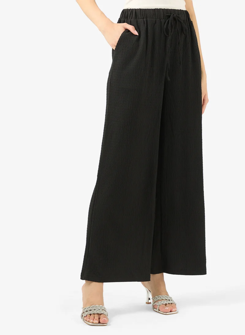 خزانة طقم بنطلون وقطعة علوية طويلة