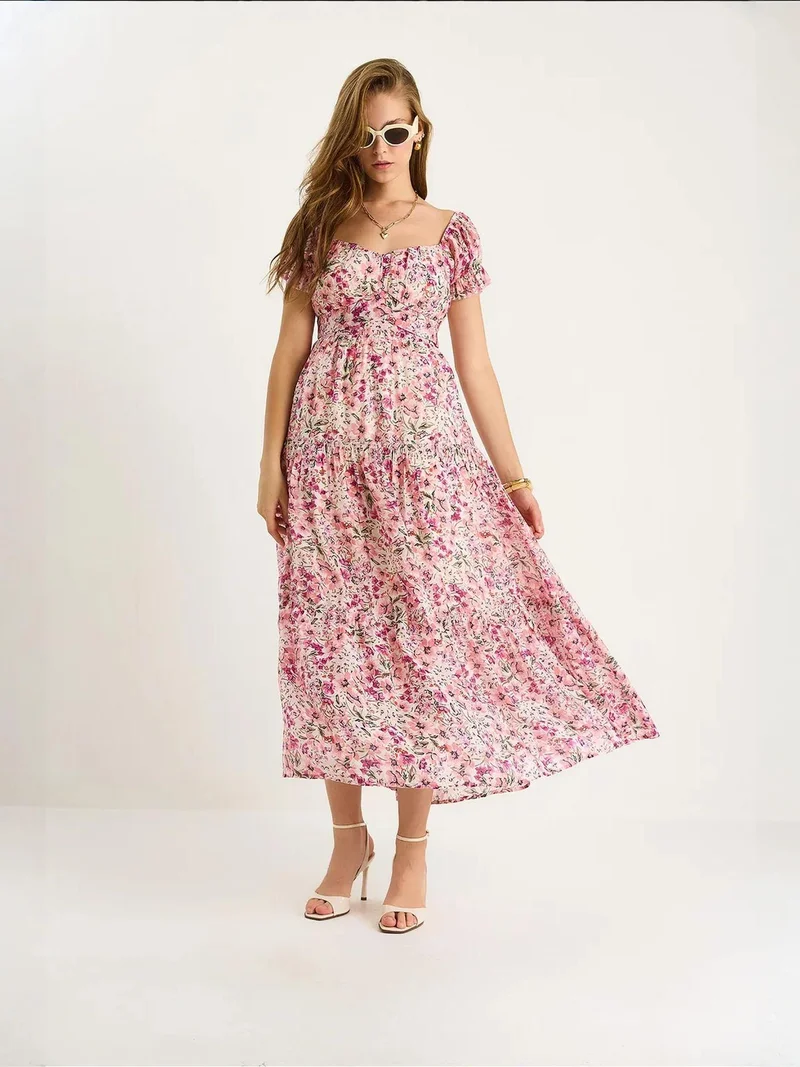 بيانكو لوتشي فستان ميدي من لوكسي بياقة على شكل قلب وطبعة زهور