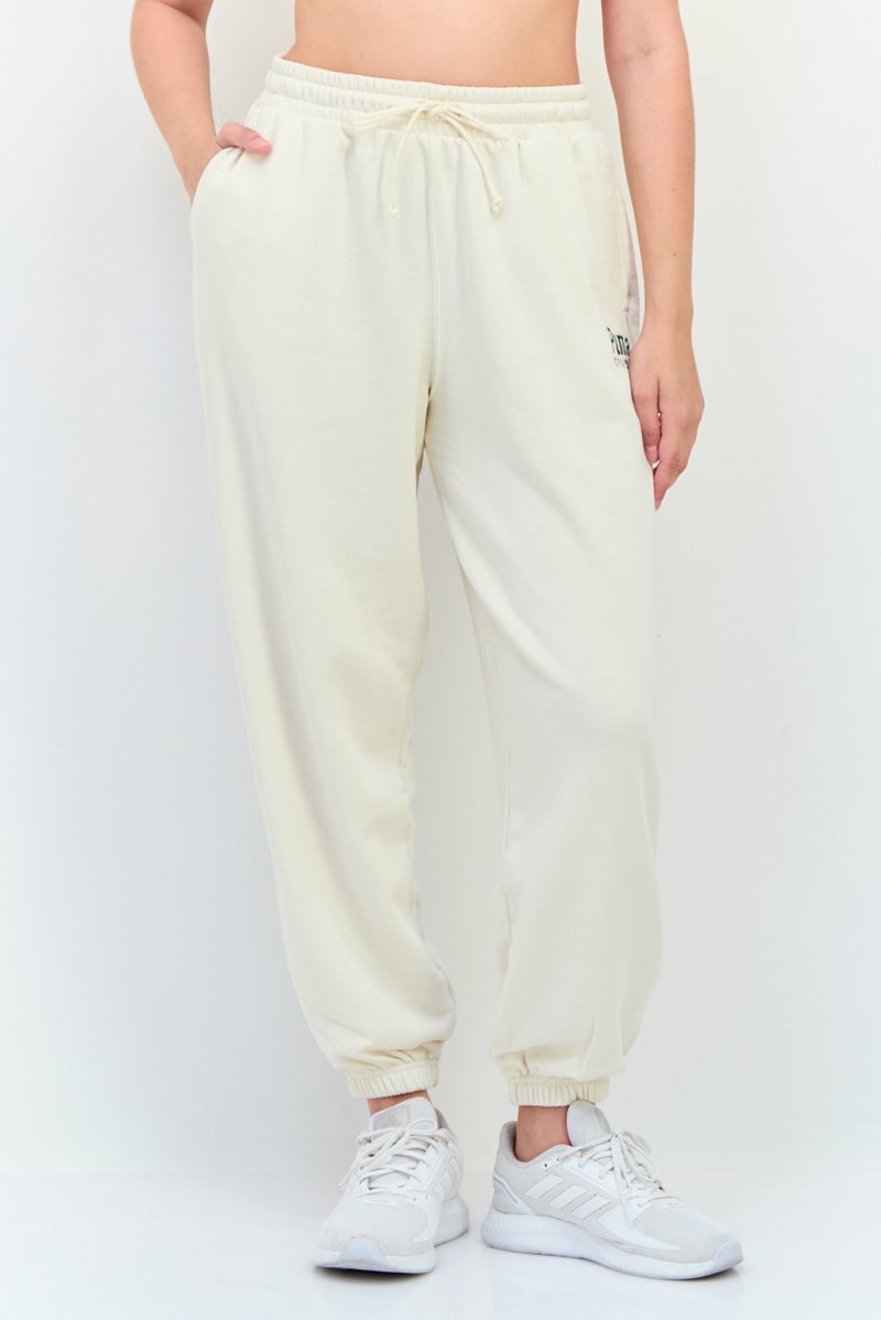 PUMA سروال رياضي نسائي مناسب في الهواء الطلق، أبيض فاتح - Image 1