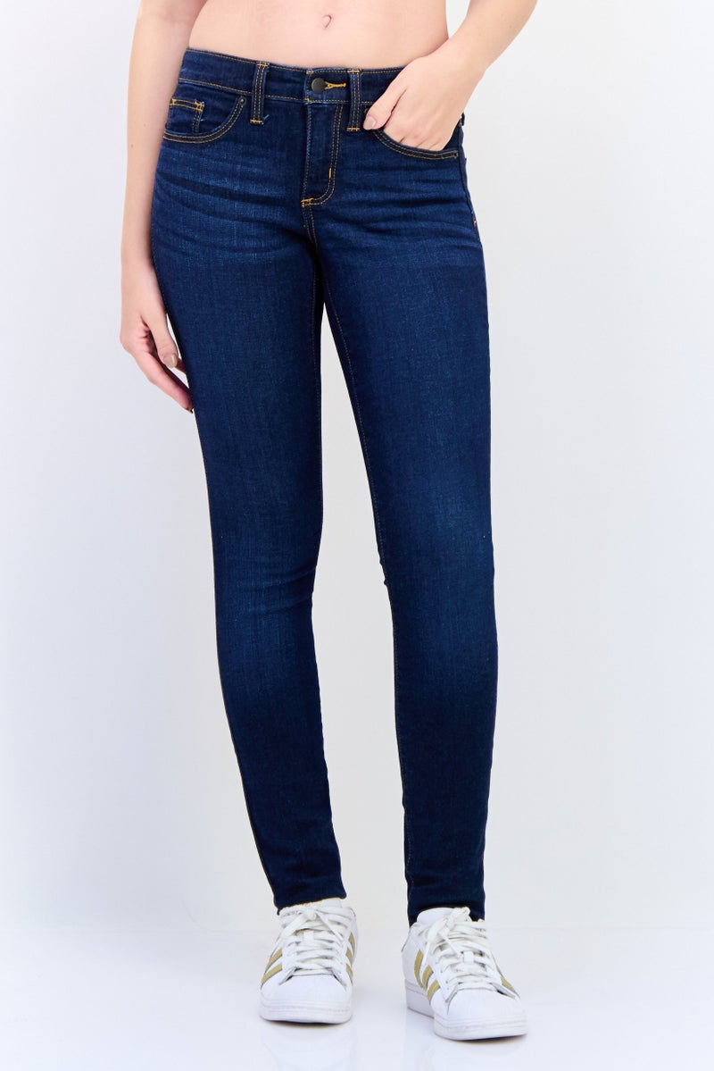 Universal Thread جينز نسائي ضيق الخصر متوسط قابل للتمدد، غسول أزرق متوسط - Image 1