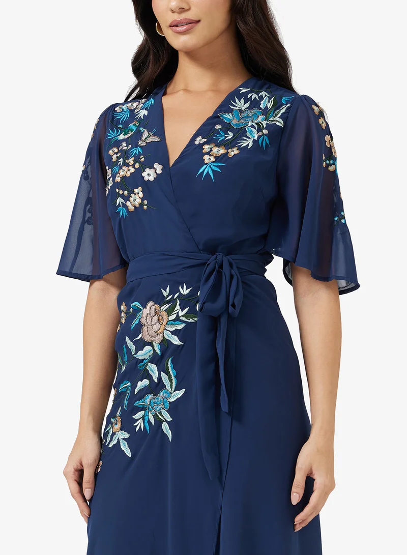 Hope & Ivy Embroidered Flutter Sleeve  Tie Waist Detail Wrap Maxi Dress