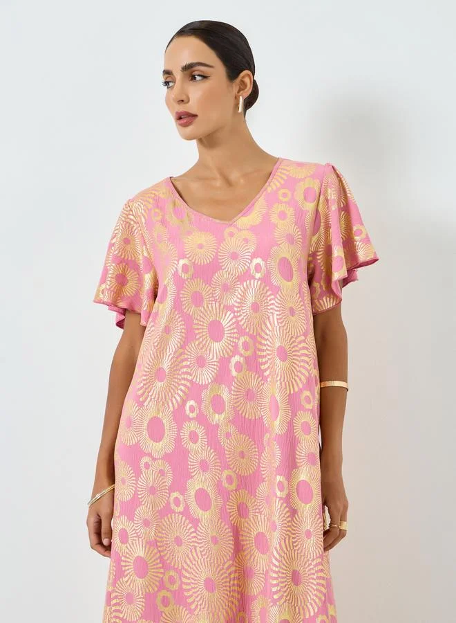 تايك تو جلابية بطبعة جرافيك وأكمام قصيرة