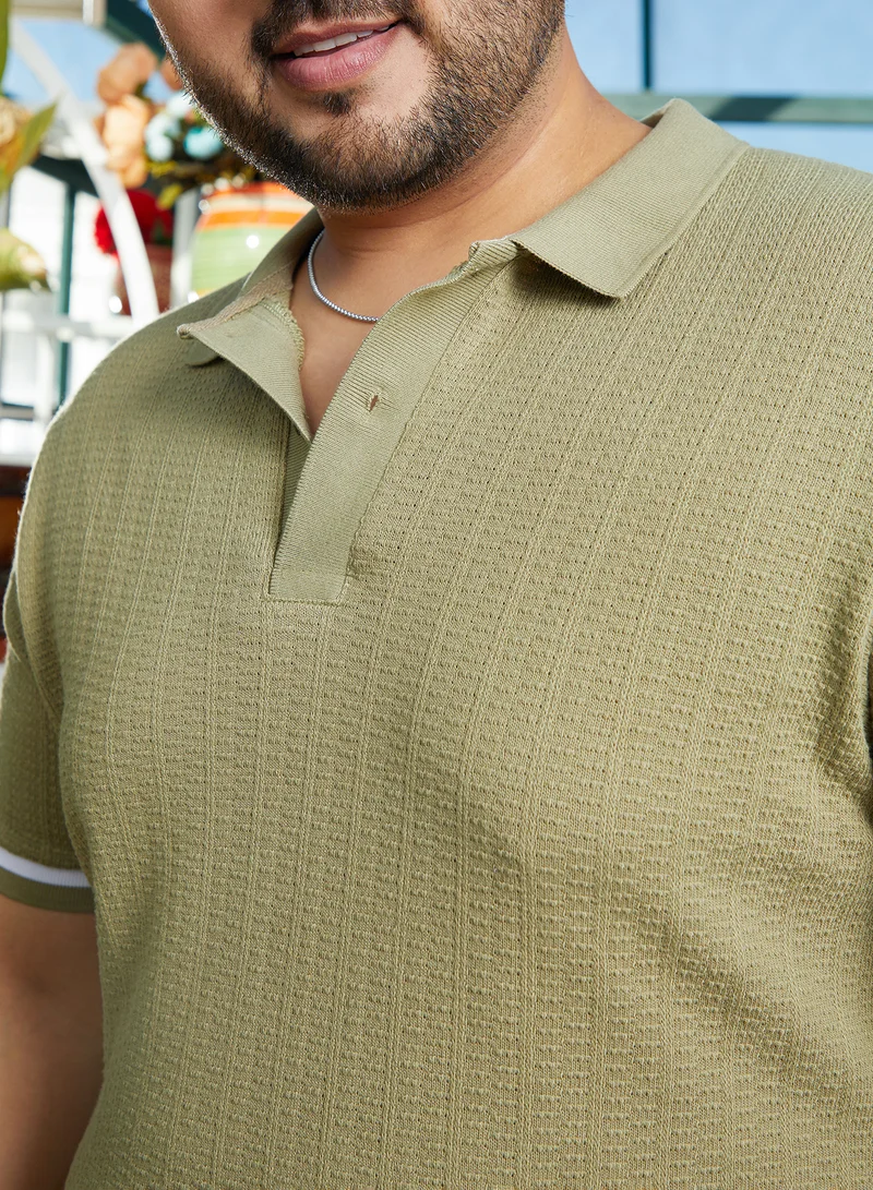 Instafab Plus Instafab Plus Men's Olive Green Textured Polo T-Shirt For Casual Wear | Polo Neck | Short Regular Sleeves | Half-Button Closure | Plus Size T-Shirt Crafted With Comfort Fit For Everyday Wear