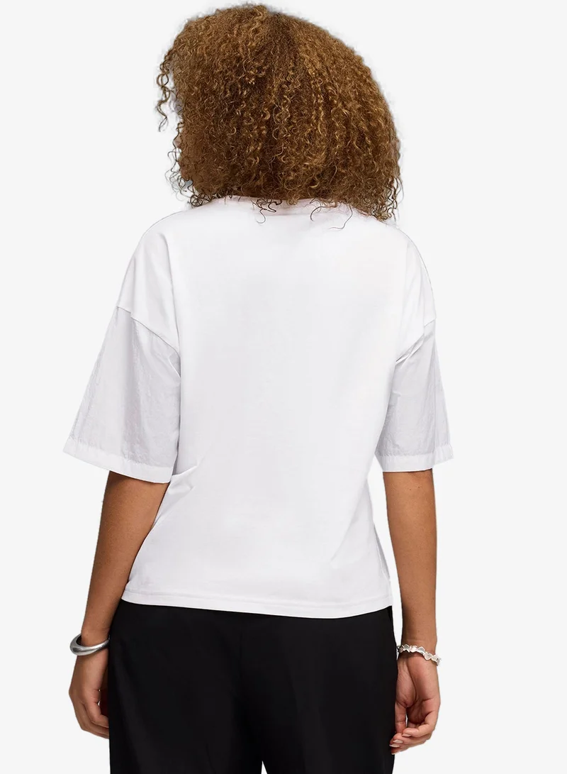 بوما تيشيرت نسائي فضفاض