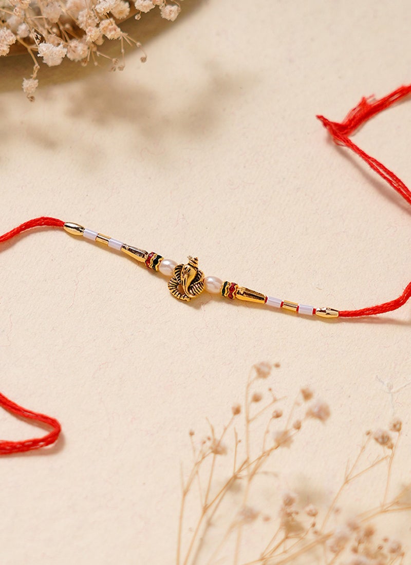 Madhoor Ganesha Pearl Rakhi for Brother Red Designer Raksha Bandhan Thread ,Premium Handmade ,1 Piece-33 CM - Image 1