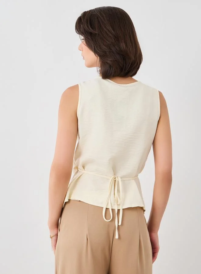 Take Two Take Two Solid Sleeveless Buttoned Wrap Top