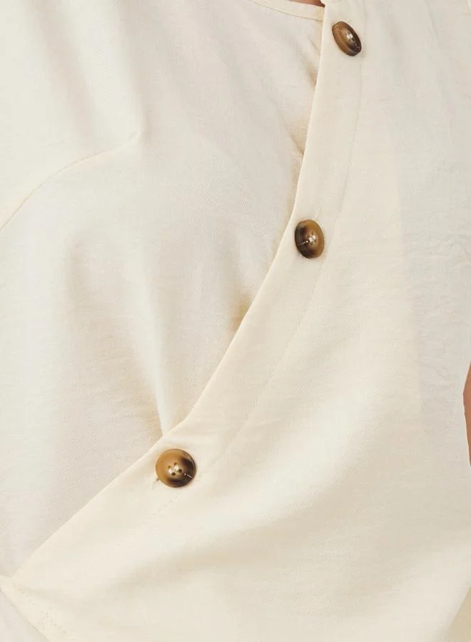 Take Two Take Two Solid Sleeveless Buttoned Wrap Top