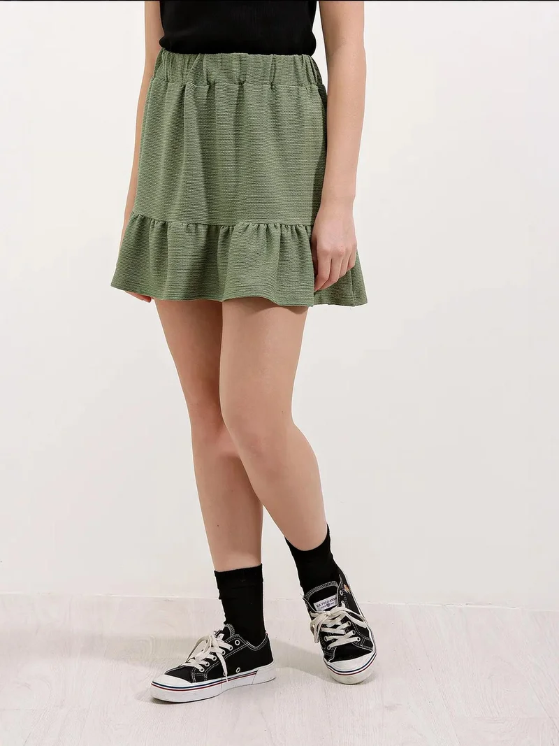 بيغ دارت تنورة قصيرة محبوكة بنقوش بارزة وتفاصيل مكشكشة