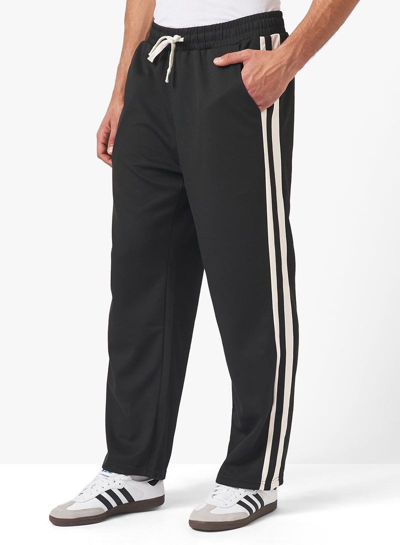 سفنتي فايف بنطلون رياضي فضفاض ببانل - Image 1