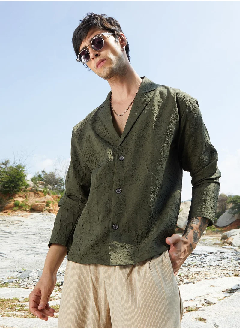 كامبوس سوترا Campus Sutra Men's Army Green Wrinked Korean Oversized Shirt For Casual Wear | Lapel Collar | Long Sleeve | Button Closure | Oversized Shirt Crafted With Comfort Fit For Everyday Wear