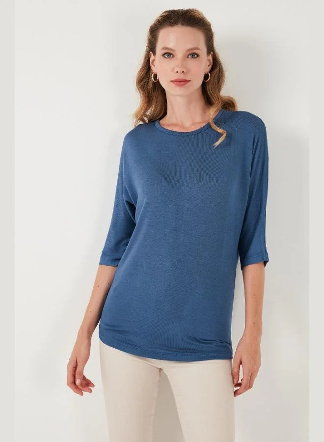 ليلا بلوزة قطنية أساسية بدون أكمام بياقة مستديرة للنساء من ليلا تروفكار