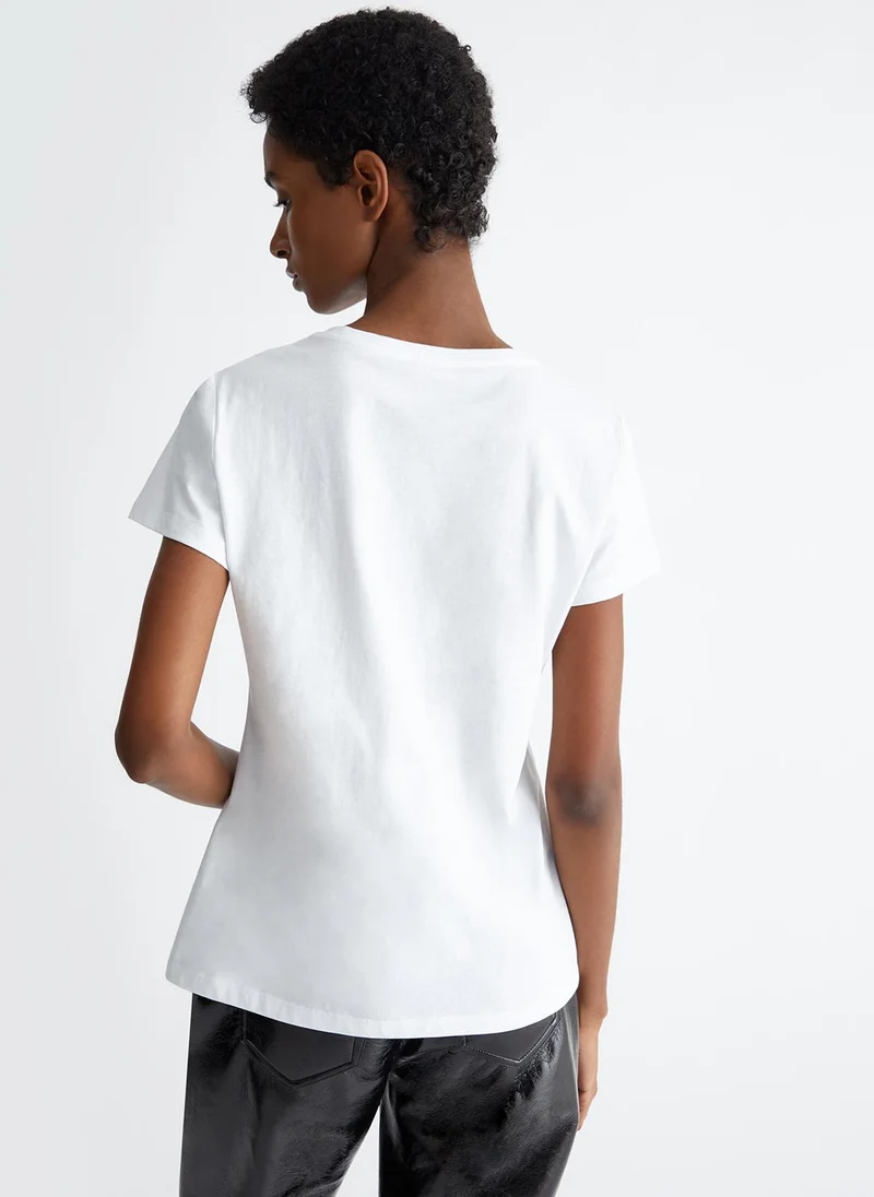 ليو جو تي شيرت مزين بالترتر وشعار الماركة