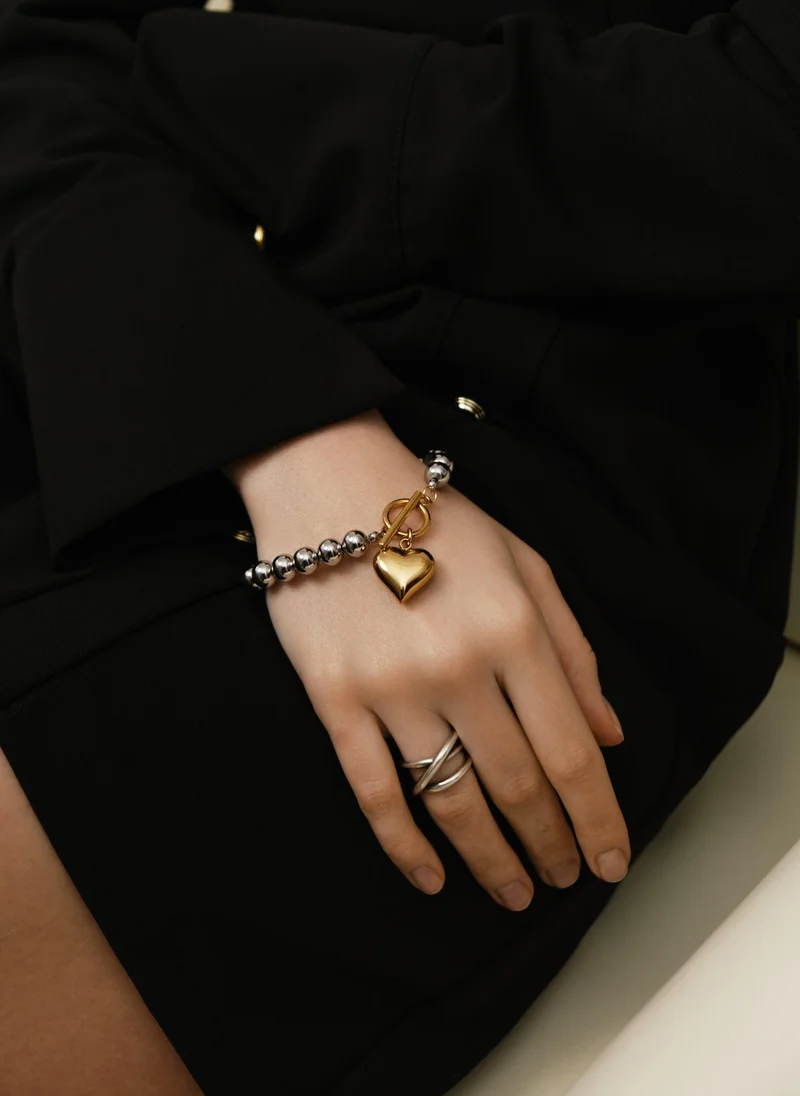 Metal beads bracelet with heart decoration