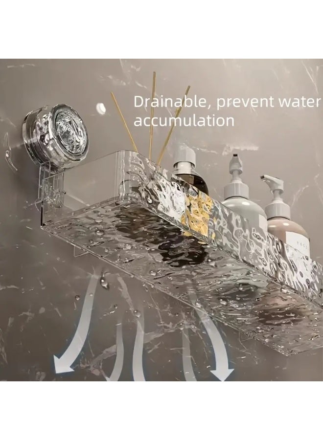 ناما رف حمام أو منظم حمام أنيق وعملي. مصنوع من الأكريليك أو البلاستيك الشفاف المتين، ويتميز بسطح ذو ملمس متموج يسمح بتصريف المياه بسهولة، مما يمنع تراكمها ويحافظ على أدوات النظافة جافة. يحتوي على نظام تثبيت قوي يعتمد على أكواب الشفط (suction cups)، مما يجعله سهل التركيب على الأسطح الملساء مثل بلاط الحمام دون الحاجة للحفر - Image 2