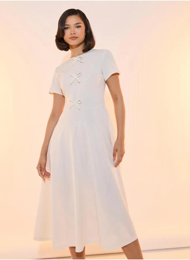 Take Two Bow Accent Round Neck A-Line Midi Dress