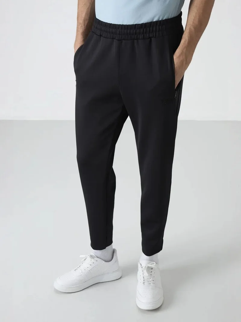 تومي لايف TOMMY Men's Solid Jogger Sweatpants