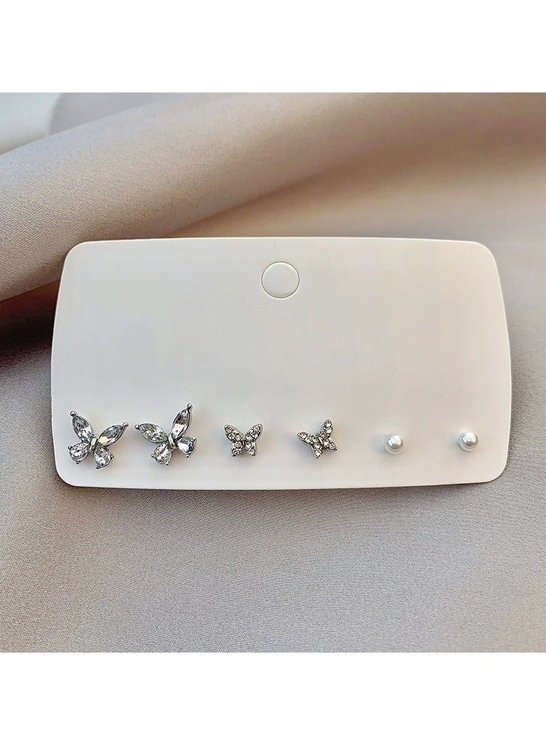 Goolsky طقم أقراط فراشة من الزركون واللؤلؤ مكون من 3 أزواج للنساء – أقراط أنيقة ورقيقة، دبابيس فضة S925، مجوهرات هدايا فاخرة - Image 1