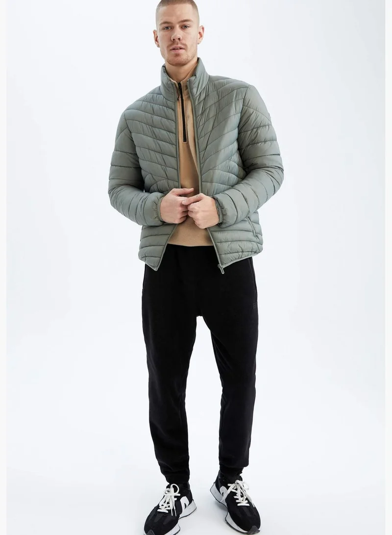 ديفاكتو جاكيت بومبر بأكمام طويلة بقصة قياسية