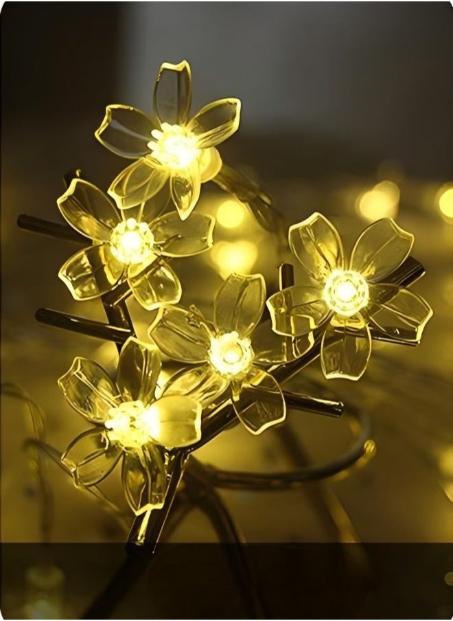 واحة المنزل الجميلة - سلسلة أضواء زهر الكرز ساكورا 3M 20 LED - أبيض دافئ، تعمل بالبطارية (2 × AA)، إضاءة ثابتة، أضواء خرافية زهرية 3 سم لغرفة النوم والحفلات وحفلات الزفاف والديكور الداخلي - Image 1