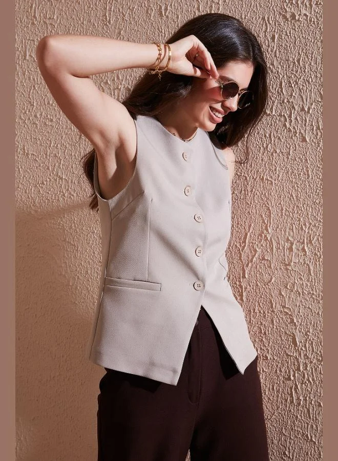 ليلا بلوزة فيست نسائية بدون أكمام بياقة دائرية وأزرار من ليلا
