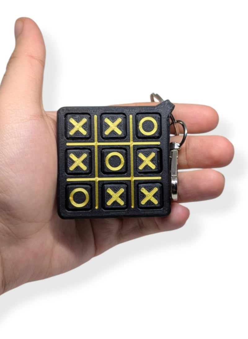Play XO Keychain – لعبة إكس أو - لعبة ذهنية بسيطة بقطع متحركة  – تعليقة شنطة ومفاتيح – هدية ممتعة لجميع الأعمار – 6×6 سم - Image 5