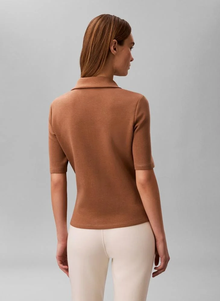 كالفن كلاين بلوز بولو بسحاب نصفي