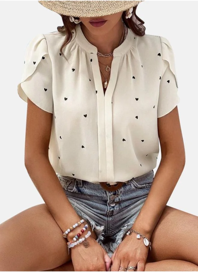 يونيكي Cream Graphic Print Top