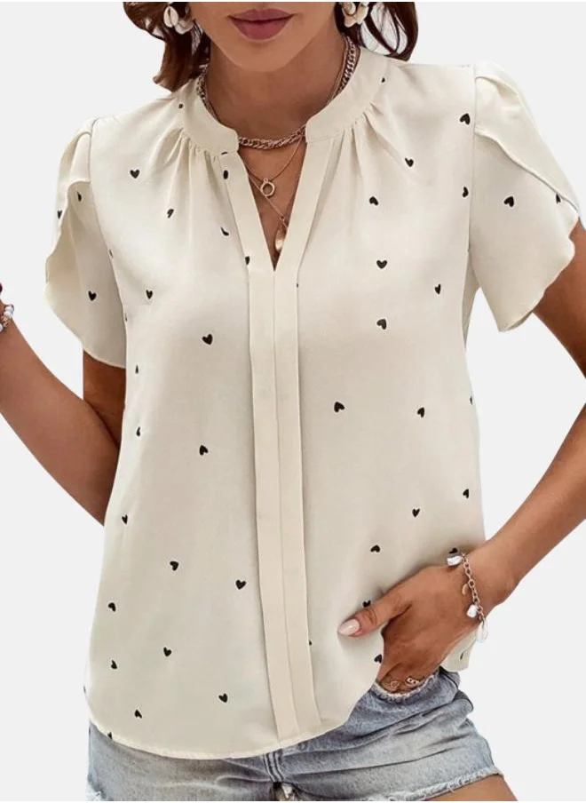 يونيكي Cream Graphic Print Top