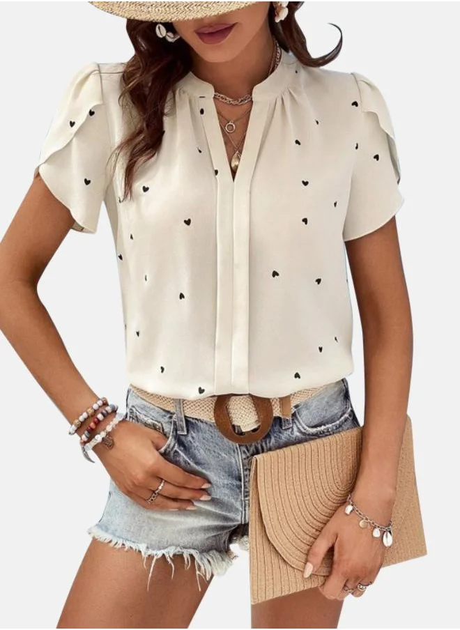 يونيكي Cream Graphic Print Top