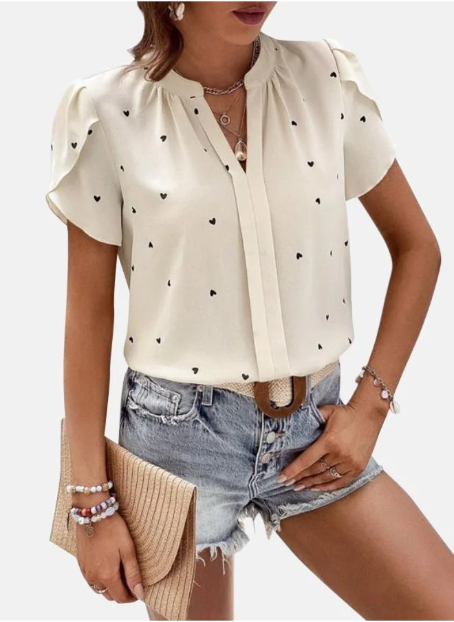 يونيكي Cream Graphic Print Top