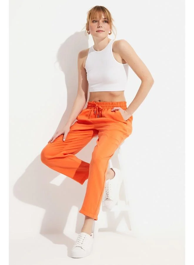 JUNE June Women Exclusive Elastic Waist Modal Blend Jogger Woven Trouser Orange