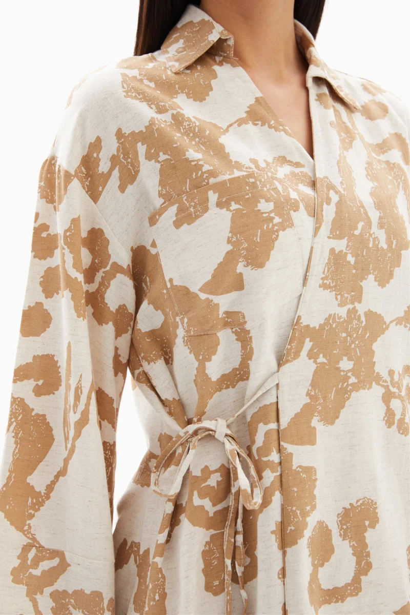 Wecre8 Beige Abstract Printed Set of Blouse with Trousers By WECRE8
