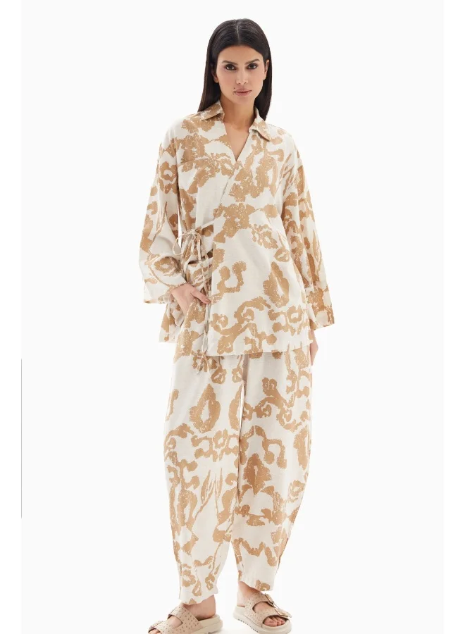 Wecre8 Beige Abstract Printed Set of Blouse with Trousers