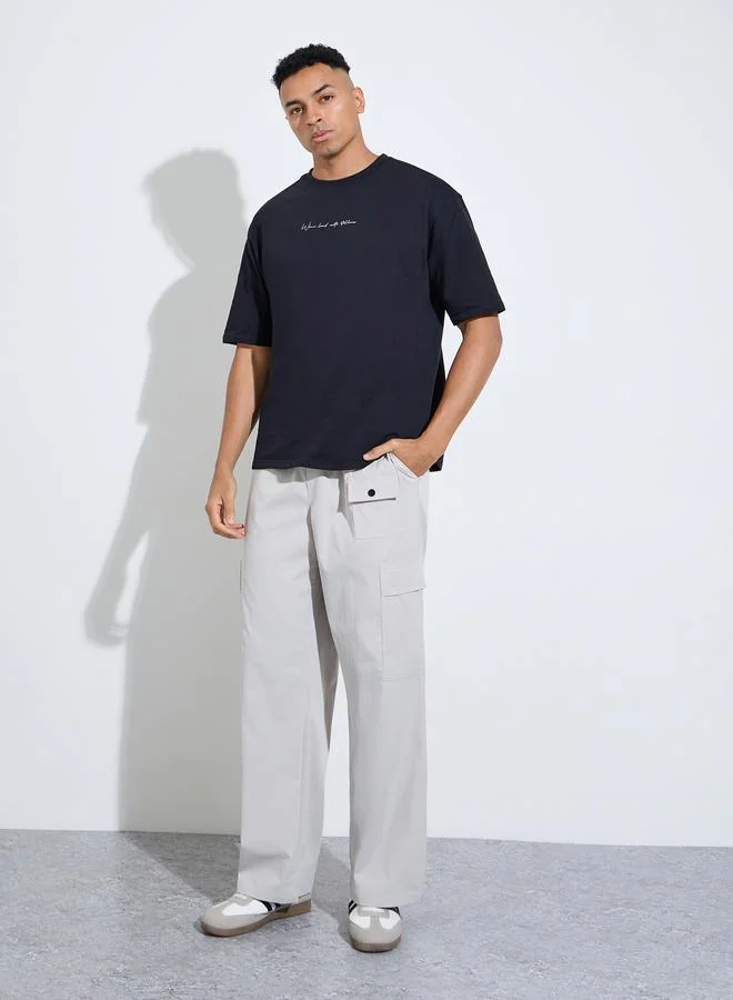 Styli Black Graphic Print Crew Neck Oversized T-Shirt