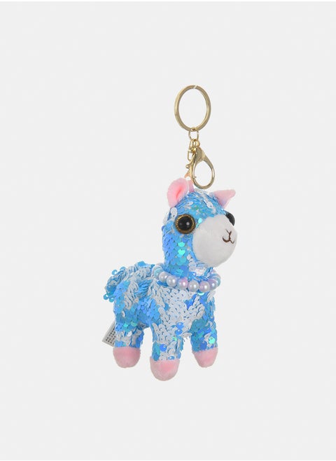 A medal in the shape of a dog with sequins
