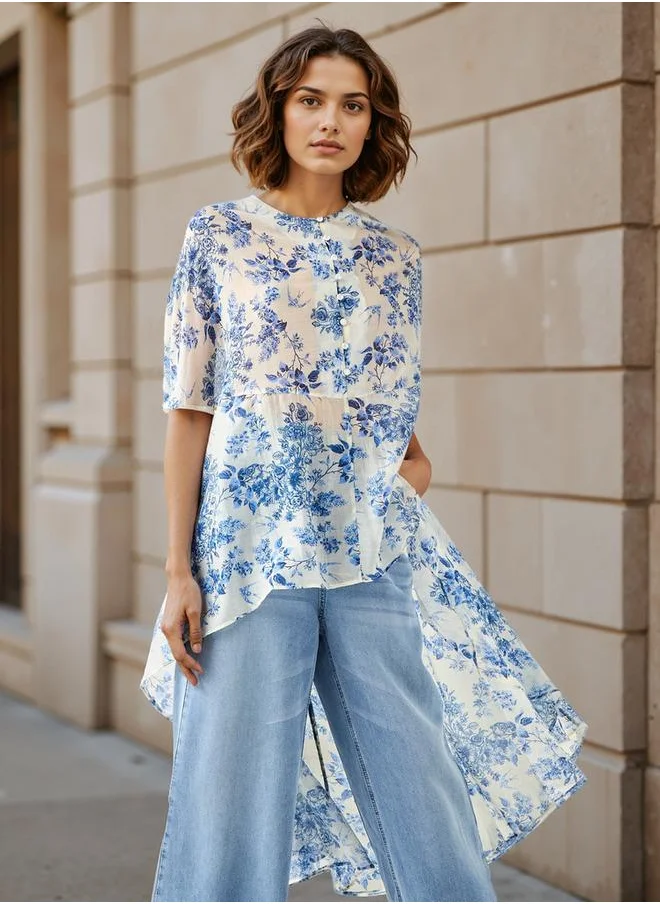 ايكونيك Iconic All-Over Floral Print High Low Cape Top
