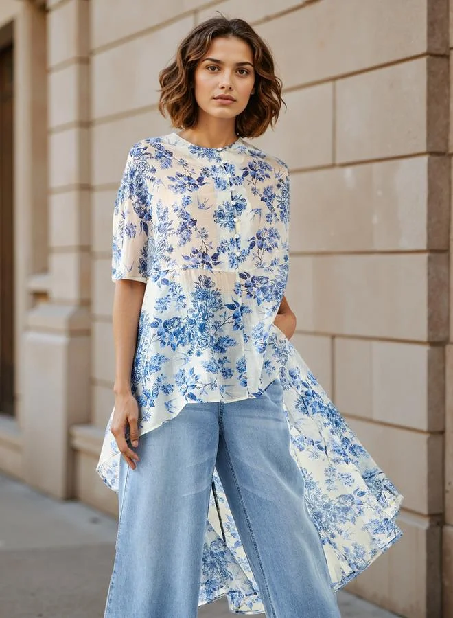 Iconic Iconic All-Over Floral Print High Low Cape Top