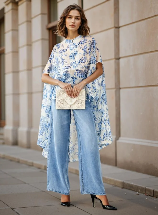 Iconic Iconic All-Over Floral Print High Low Cape Top