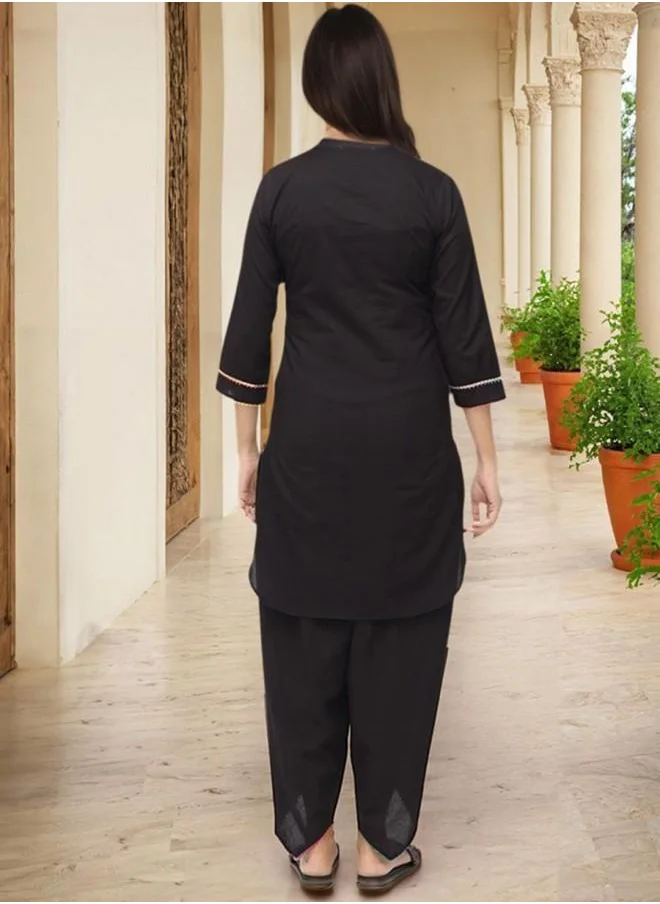 ISHIN Elastic Women Black Cotton Kurta Set with Embroidered pattern Tunic and Palazzo features a Round neckline and Three-Fourth Sleeve secured with Elastic closure and styled in Straight Fit ideal for Festive moments — a must-have for your statement wardrobe.